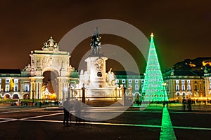 Illuminated Praca do Comercio at night in Lisbon