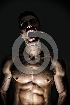 Illuminated Werewolf Man Opening His Mouth photo