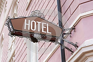 Illuminated sign of a hotel in the popular tourist resort of Riva del Garda in Italy