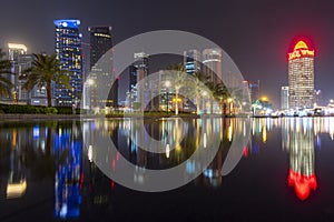 Illuminated skyline in West Bay, Doha Qatar photo