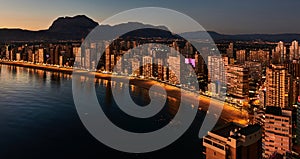 Illuminated skyscrapers of a Benidorm city at night. Spain