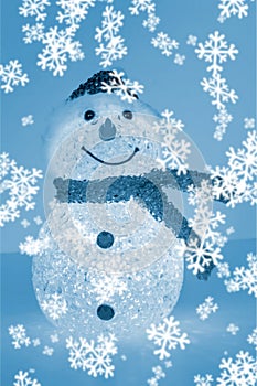 Illuminated snowman with white snowflakes on blue background