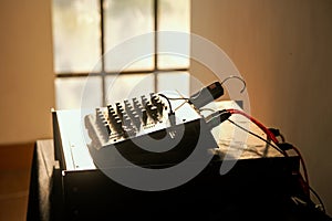 Illuminated sound mixing console in a studio