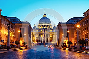 Illuminated St. Peters Basilica in Vatican City at night. Most famous square