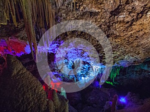 Illuminated Stalactites and stalagmites in Ngilgi cave in Yallingup