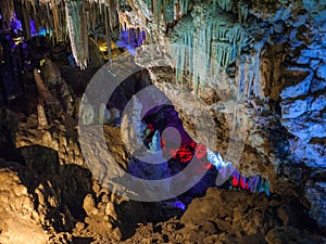 Illuminated Stalactites and stalagmites in Ngilgi cave in Yallingup