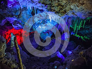 Illuminated Stalactites and stalagmites in Ngilgi cave in Yallingup