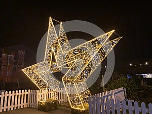 Illuminated star shape feature, Taken outdoors at night