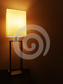 Illuminated table lamp in a dark room
