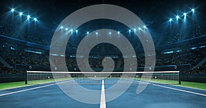 Illuminated tennis blue court before the game in a hall full of spectators