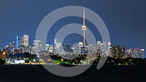 Illuminated Toronto skyline featuring CN Tower at night photo