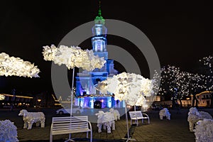 Illuminated town hall at Christmas in Kaunas Lithuania night scene