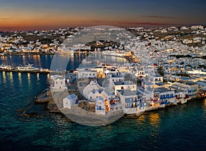 The illuminated town of the island of Mykonos just after summer sunset time