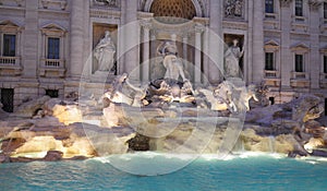 Illuminated Trevi Fountain At Dusk In Rome Italy