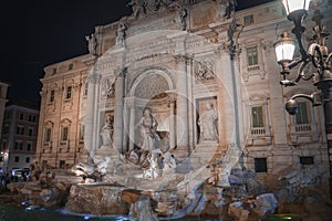 Illuminated Trevi Fountain at Night in Rome, Italy