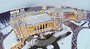 Illuminated Tsaritsyno Palace at winter evening in photo