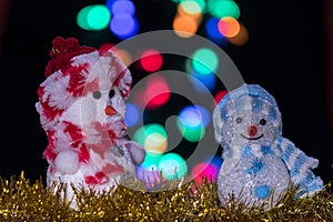 Illuminated two Snowman dolls