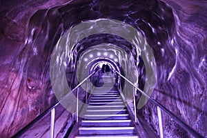 Illuminated underground entrance of Turda salt mine, Romania