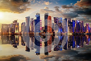 The illuminated, urban skyline of Doha, Qatar