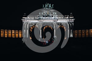 Illuminated view of a grandiose building against a dark night sky: Brussels Jubelpark