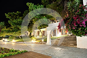 Illuminated villas at luxury hotel