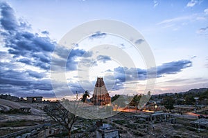 Illuminated Virupaksha temple at sunset