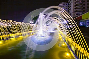 Illuminated Water Fountain By Night
