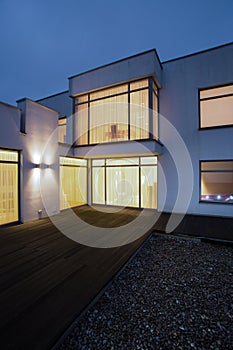 Illuminated windows in detached house