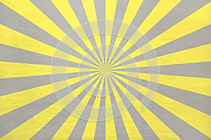 Illuminating Yellow and Ultimate grey retro starburst in alternating stripes - abstract pastel stone background photo