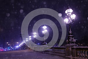 Illumination on Alexander 3 bridge, night and snow