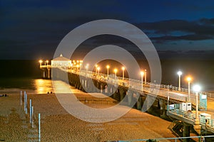 Illuminations of Manhattan Beach Pier at night