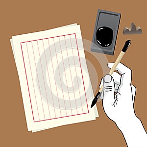 A hand holding a Chinese calligraphy brush.