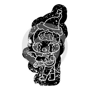 quirky cartoon distressed icon of a big brain alien crying and pointing wearing santa hat