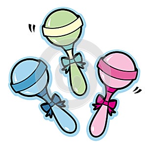 Illustration of baby rattles in blue green pink and yellow photo