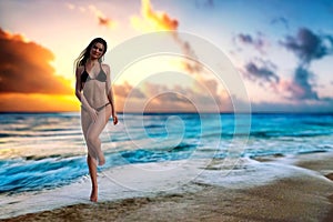 Illustration of a beautiful woman wearing a black bikini standing on one leg with a colorful sunset in the background