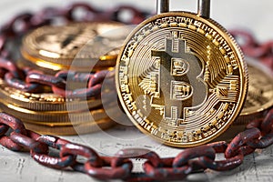 Illustration of bitcoing and padlock on white background, high resolution photography