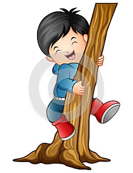 Boy climbing the tree