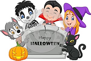 Cartoon kids with Halloween costume holding tombstone