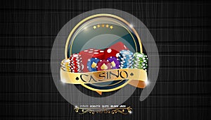 Casino colorful chips with red dice and golden ribbon on dark background