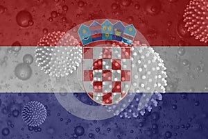 Illustration of the Coronavirus behind the Croatian flag