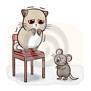 Coward cat on a chair scared of mouse photo