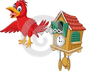 Cuckoo clock with red bird chirping photo