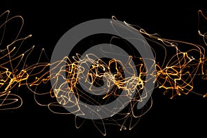 illustration of fire luminous curly lines representing sound wave isolated on black background with copy space. Banner