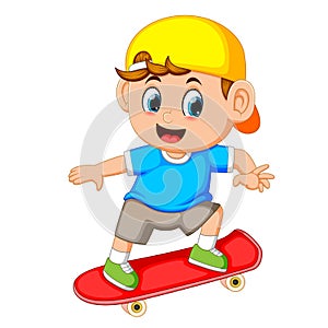 Happy boy playing skateboard