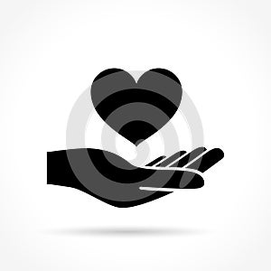 Heart in hand icon