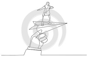 Illustration of huge hand holding paper plane and take off with muslim woman. Single line art style