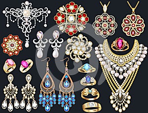 jewelry set of necklaces, earrings, brooches, pendants, gold rings with precious stones