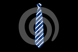 Illustration of neck tie on black background.