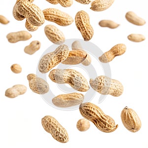 Falling peanuts isolated on white background