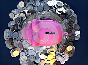 Pink piggy bank, ceramic shiny, on pile of 50 cents USA coins, on dark background, 3d render